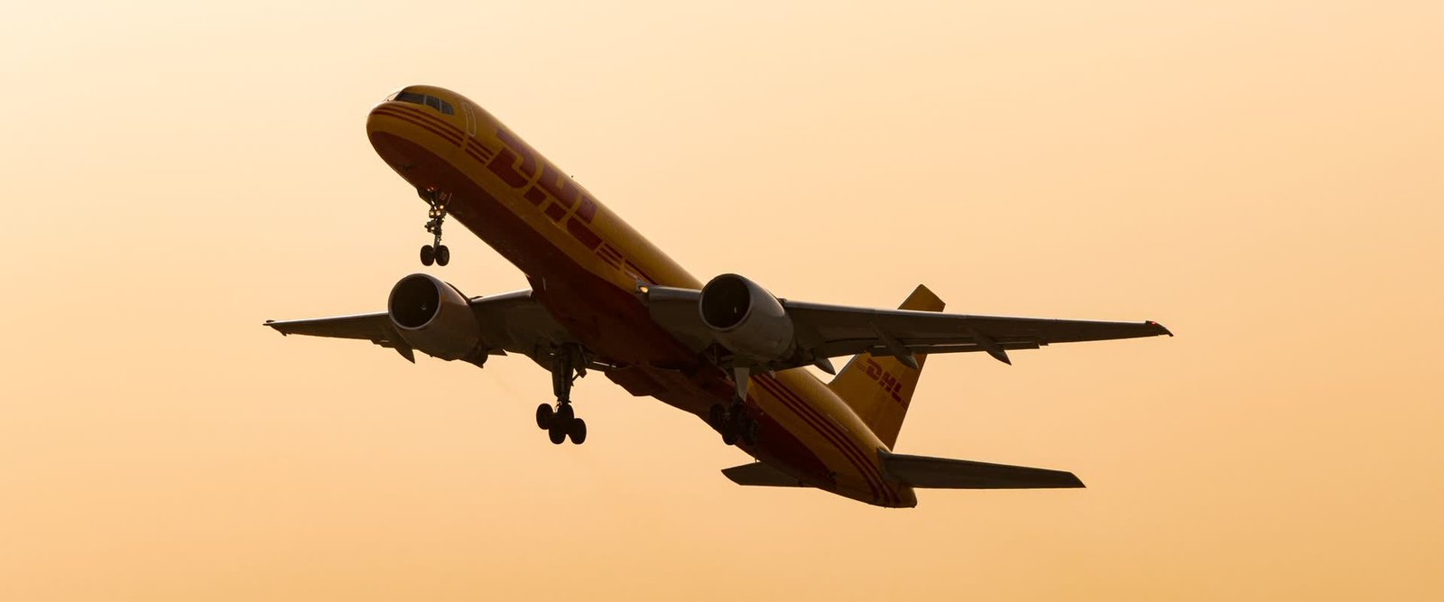 Cargo aircraft departing at sunset on the India to United States freight route