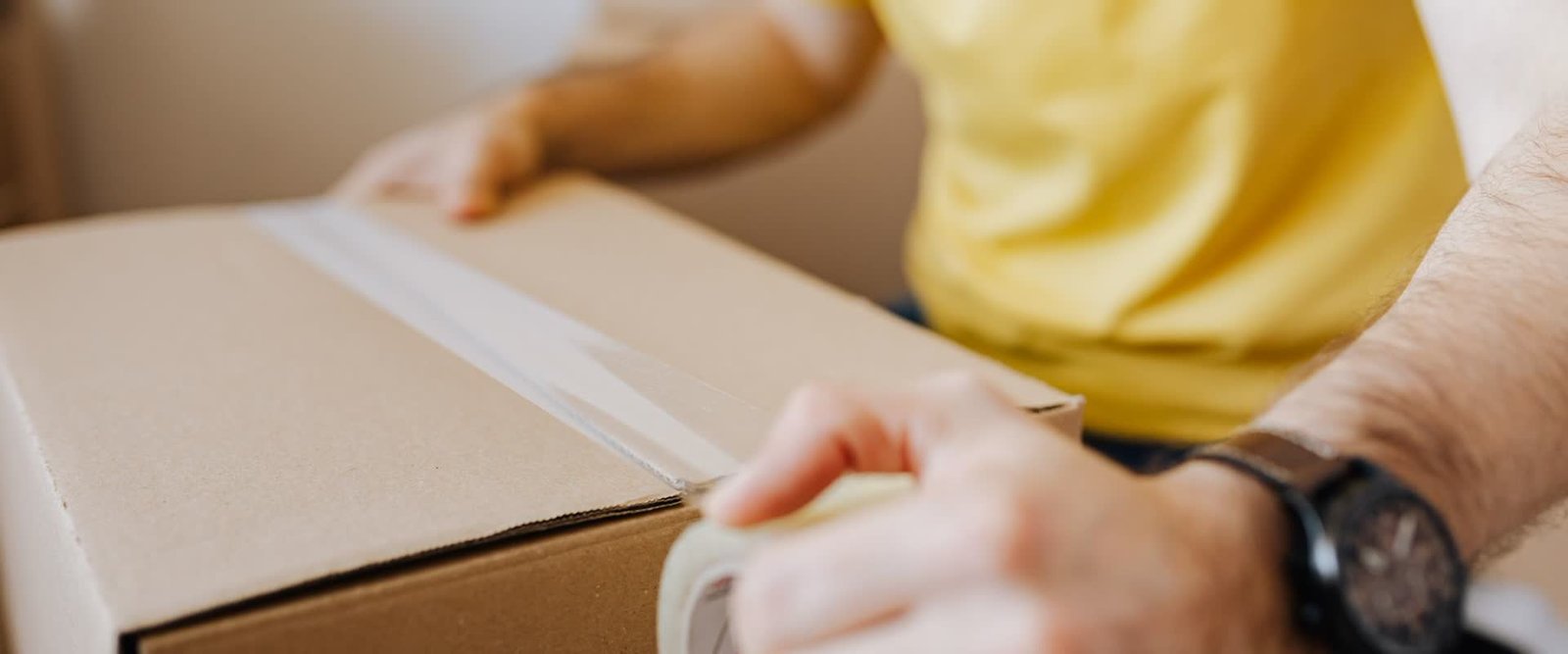 A parcel being sealed and repacked for international export